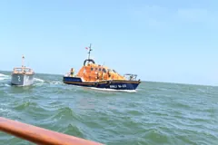 Gerfalcon alongside an RNLI lifeboat