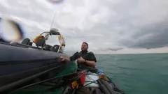 Taking a break beside the support boat
