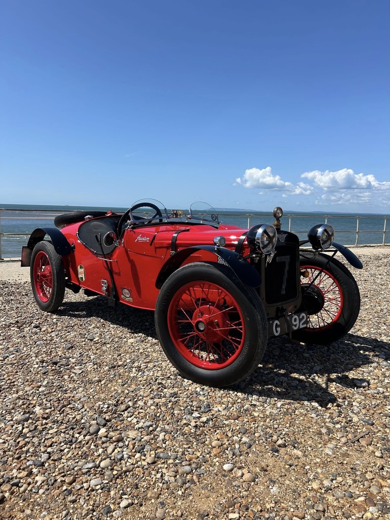 My red pre-war Austin parked by the sea
