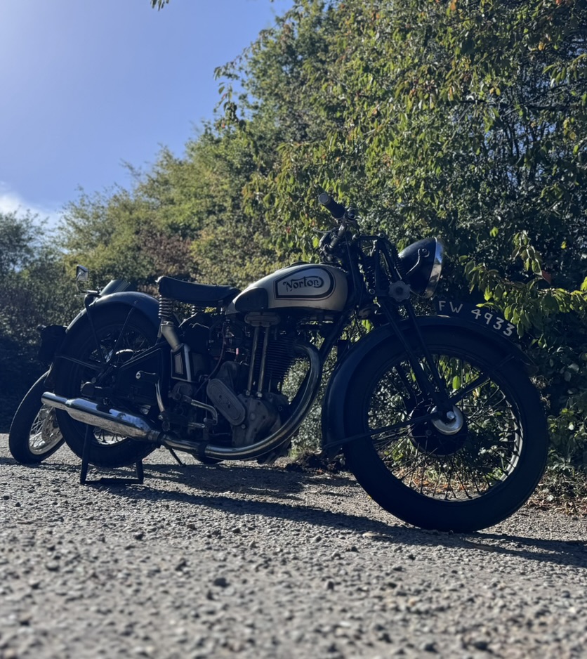 My pre-war Norton motorcycle on a sunny country lane